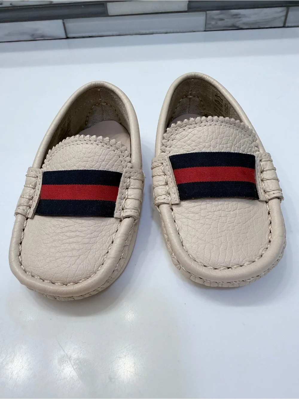 Elephantito Cream Moccasins with Navy & Red Stripe